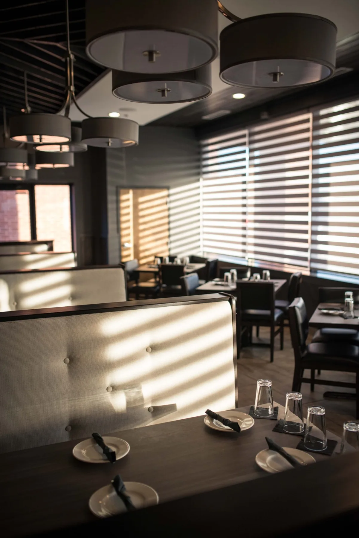 The warmly lit dining room at L.A. Bistro Canton